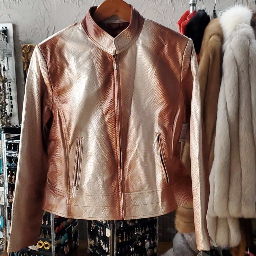 Women's snake print leather jacket by Terry lewis